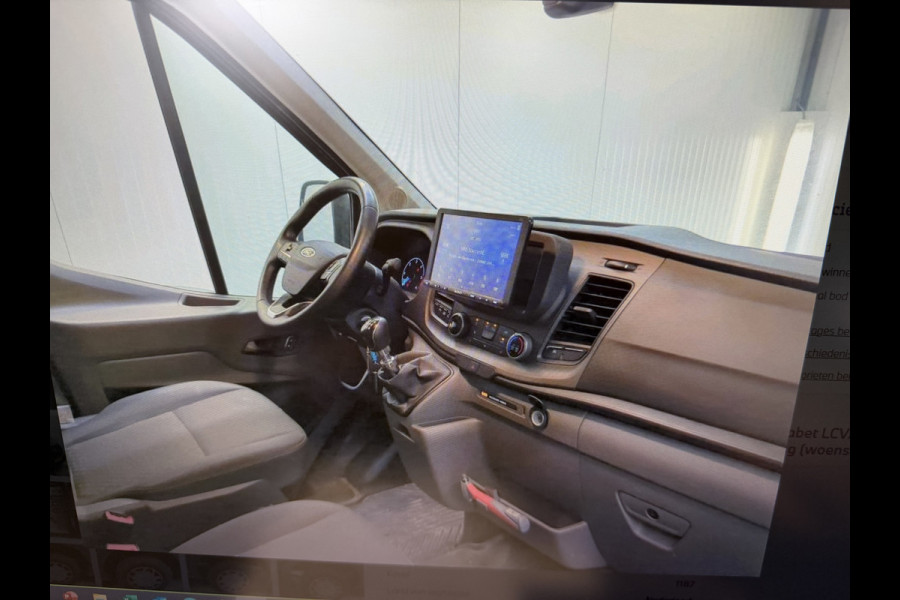Ford Transit 290 2.0 TDCI L2H2 Trend / vaste prijs rijklaar € 25.950 ex btw / lease vanaf € 424 / euro 6 / bpm vrij / ingerichte laadruimte / onderweg naar ons toe