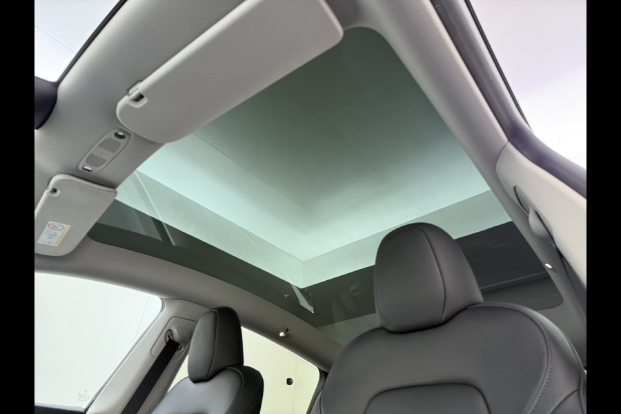 Tesla Model Y RWD 300PK SOH 90% Trekhaak Warmtepomp LFP-Accu Premium-Audio AMD Ryzen™ Camera's Navi Ecc Led Lmv 19" Privacy Glas Leder Stoel+Stuurverwarming Panoramadak Bluetooth Elek.Achterklep 1.600KG Trekgewicht 1e Eigenaar Origineel Nederlandse Auto