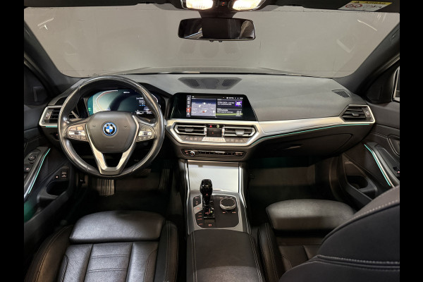 BMW 3 Serie Touring 320e Business Edition Plus | Panoramadak | Wegkl. trekhaak | Vol leder