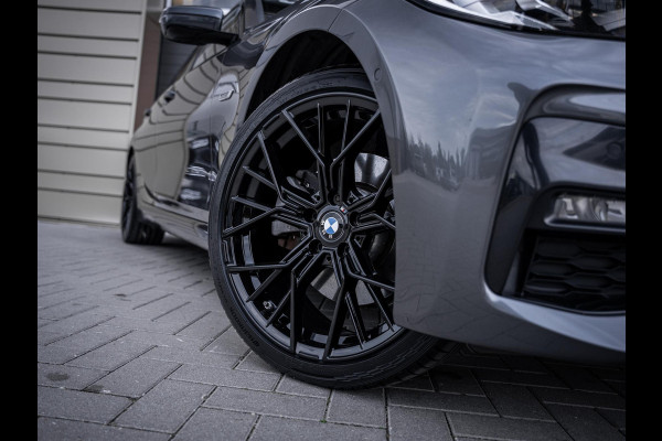 BMW 3 Serie Touring 320e High Executive M-Sport l Pano l ACC | Trekhaak l 360cam l ACC