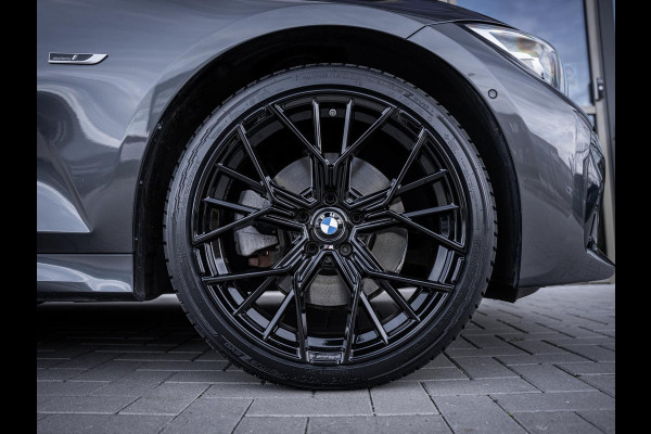 BMW 3 Serie Touring 320e High Executive M-Sport l Pano l ACC | Trekhaak l 360cam l ACC