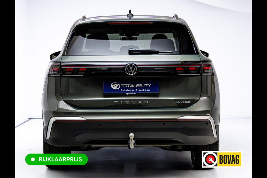 Volkswagen Tiguan 1.5 eHybrid Elegance | Elec. trekhaak | HUD | Pano dak | Stoel- stuur- & achterbankverw. | IQ Led | Adap. Cruise | Massagestoelen, Sfeerverlichting, Navigatie, App. connect, Spraakbediening, 19"LMV, Cipressino Green Metallic