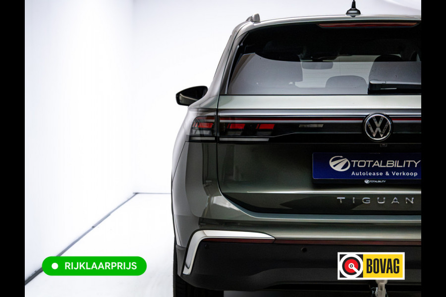 Volkswagen Tiguan 1.5 eHybrid Elegance | Elec. trekhaak | HUD | Pano dak | Stoel- stuur- & achterbankverw. | IQ Led | Adap. Cruise | Massagestoelen, Sfeerverlichting, Navigatie, App. connect, Spraakbediening, 19"LMV, Cipressino Green Metallic