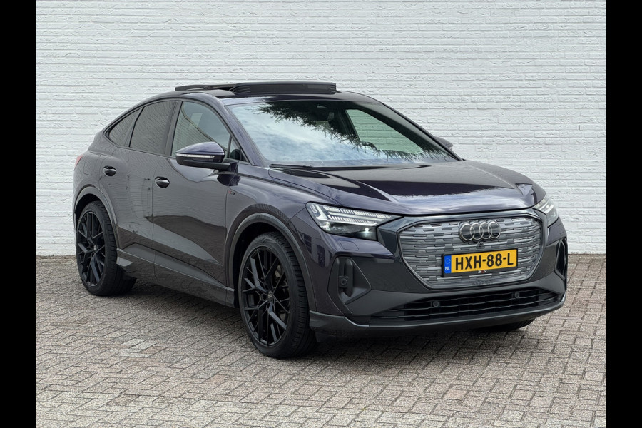 Audi Q4 Sportback e-tron 40 S-line Competition SOH 91% Pano dak Blokjes leder Sonos 21 inch + all season