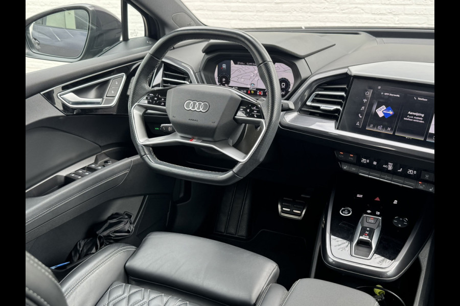 Audi Q4 Sportback e-tron 40 S-line Competition SOH 91% Pano dak Blokjes leder Sonos 21 inch + all season