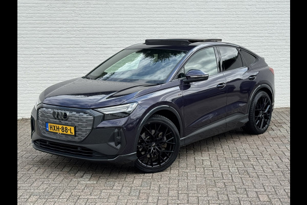 Audi Q4 Sportback e-tron 40 S-line Competition SOH 91% Pano dak Blokjes leder Sonos 21 inch + all season