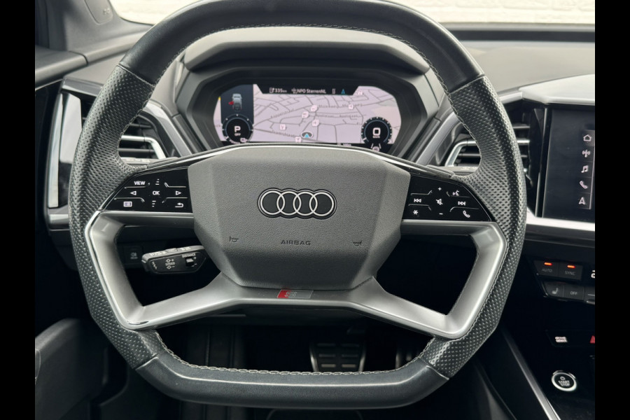 Audi Q4 Sportback e-tron 40 S-line Competition SOH 91% Pano dak Blokjes leder Sonos 21 inch + all season