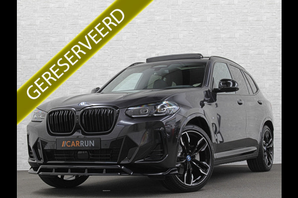 BMW iX3 M-Sport | Sophisto Grey! | Panorama | ACC | Leder | Memory | El. Trekhaak | 97.6% SOH | Sfeerverlichting | 3-Zone Clima | Carplay | LED | Btw auto, 32810,= ex. |