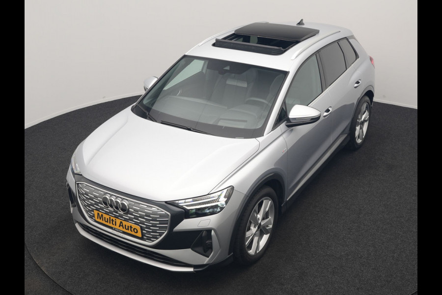 Audi Q4 e-tron 40 S Line 77 kWh 204pk Dealer O.H. | Panodak | Adaptive Cruise | Head Up | Camera | Matrix LED | Camera | Warmtepomp | Sportstoelen Memory & Verwarmd | Stuur Verwarmd | Apple Carplay | Navigatie | DAB |