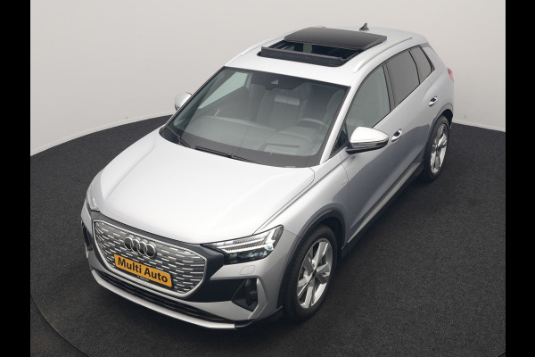 Audi Q4 e-tron 40 S Line 77 kWh 204pk Dealer O.H. | Panodak | Adaptive Cruise | Head Up | Camera | Matrix LED | Camera | Warmtepomp | Sportstoelen Memory & Verwarmd | Stuur Verwarmd | Apple Carplay | Navigatie | DAB |