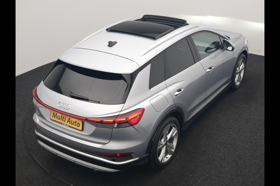 Audi Q4 e-tron 40 S Line 77 kWh 204pk Dealer O.H. | Panodak | Adaptive Cruise | Head Up | Camera | Matrix LED | Camera | Warmtepomp | Sportstoelen Memory & Verwarmd | Stuur Verwarmd | Apple Carplay | Navigatie | DAB |