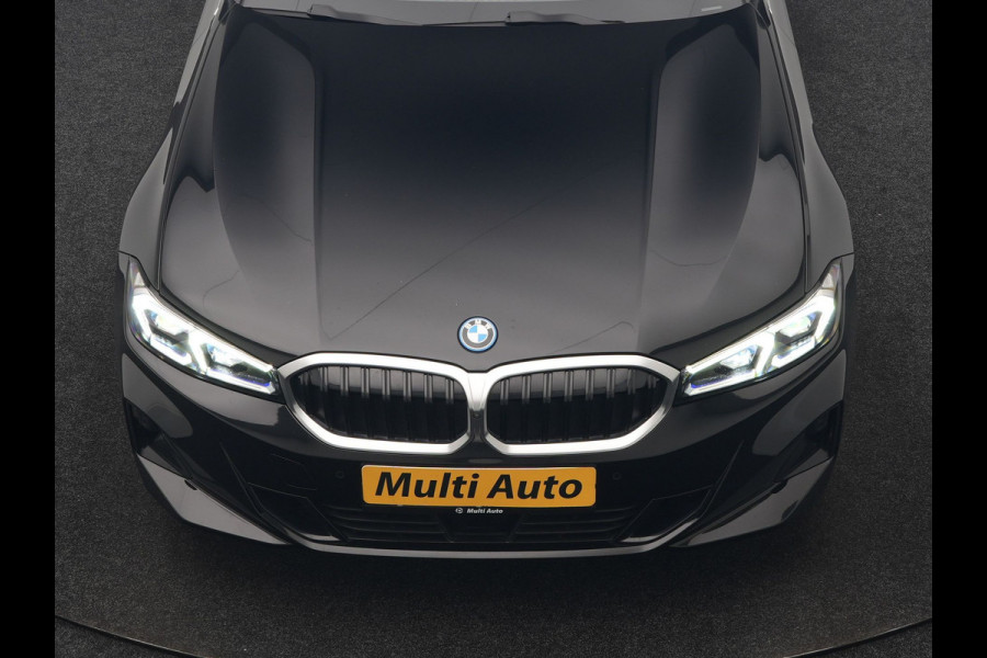 BMW 3 Serie Touring 320e Luxury Line Facelift PHEV Dealer O.H. | Trekhaak Af Fabriek | Panodak | Head Up | Adaptive Cruise | 360 Camera | Lederen Sportstoelen Verwarmd | Sfeerverlichting | Apple Carplay | Keyless | Widescreen Navi | DAB | Plug In Hybrid