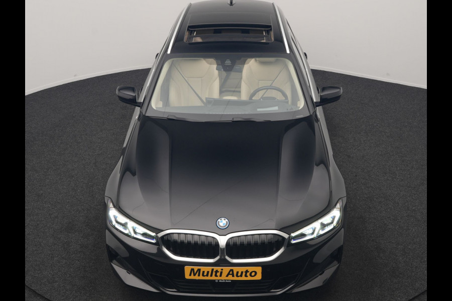 BMW 3 Serie Touring 320e Luxury Line Facelift PHEV Dealer O.H. | Trekhaak Af Fabriek | Panodak | Head Up | Adaptive Cruise | 360 Camera | Lederen Sportstoelen Verwarmd | Sfeerverlichting | Apple Carplay | Keyless | Widescreen Navi | DAB | Plug In Hybrid