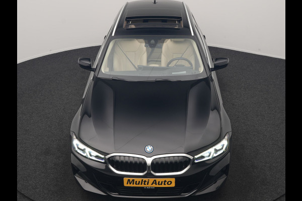 BMW 3 Serie Touring 320e Luxury Line Facelift PHEV Dealer O.H. | Trekhaak Af Fabriek | Panodak | Head Up | Adaptive Cruise | 360 Camera | Lederen Sportstoelen Verwarmd | Sfeerverlichting | Apple Carplay | Keyless | Widescreen Navi | DAB | Plug In Hybrid