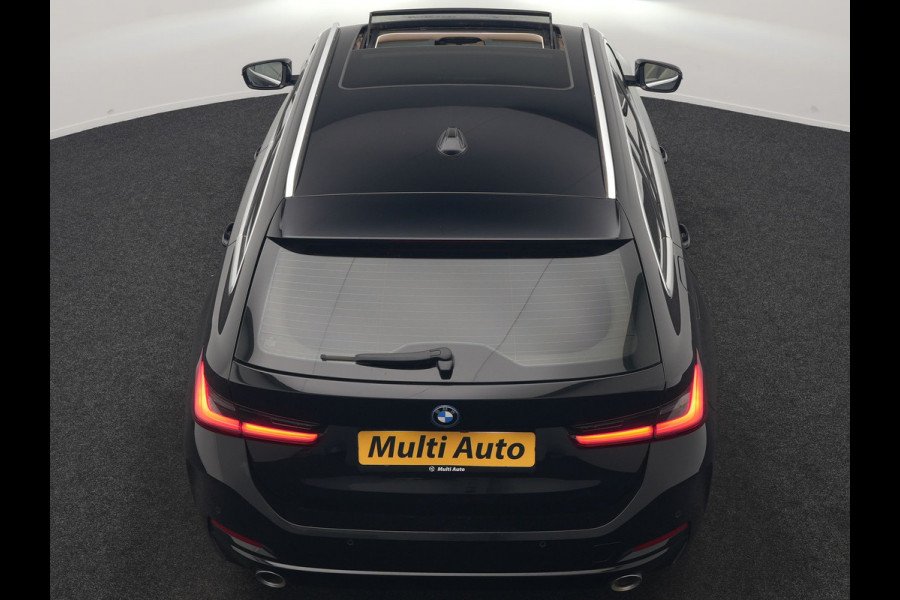 BMW 3 Serie Touring 320e Luxury Line Facelift PHEV Dealer O.H. | Trekhaak Af Fabriek | Panodak | Head Up | Adaptive Cruise | 360 Camera | Lederen Sportstoelen Verwarmd | Sfeerverlichting | Apple Carplay | Keyless | Widescreen Navi | DAB | Plug In Hybrid