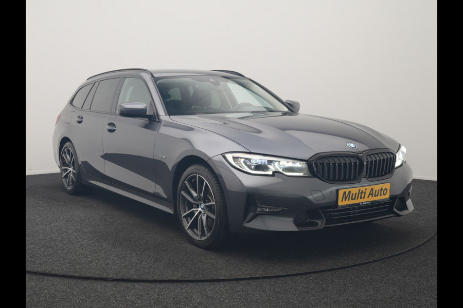 BMW 3 Serie Touring 320e xDrive Sportline PHEV 204pk Dealer O.H | SOH 88,1% | Trekhaak Af Fabriek | Camera | Laser LED | Cruise Control | Lederen Sportstoelen Verwarmd | Keyless | Sfeerverlichting | Apple Carplay | BLIS | Virtual | Navigatie | DAB | 18"L. Plug In Hybrid |