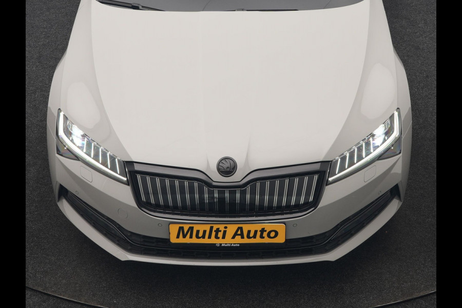 Škoda Superb Combi 1.4 TSI iV Sportline Business PHEV 218pk Dealer O.H. | SOH 91,2% | Panodak | Adaptive Cruise | Camera | Canton Audio | Alcantara Sportstoelen Memory & Verwarmd | Sfeerverlichting | Keyless | BLIS | Stuur Verwarmd | Apple Carplay | Crystal LED | Navigatie | Plug In Hybrid |