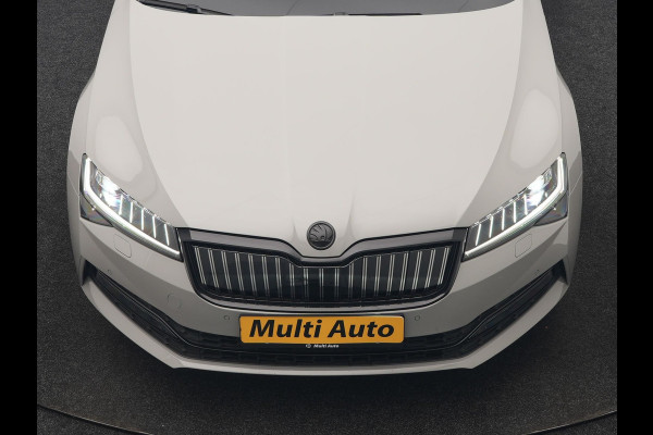 Škoda Superb Combi 1.4 TSI iV Sportline Business PHEV 218pk Dealer O.H. | SOH 91,2% | Panodak | Adaptive Cruise | Camera | Canton Audio | Alcantara Sportstoelen Memory & Verwarmd | Sfeerverlichting | Keyless | BLIS | Stuur Verwarmd | Apple Carplay | Crystal LED | Navigatie | Plug In Hybrid |
