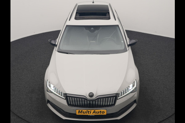 Škoda Superb Combi 1.4 TSI iV Sportline Business PHEV 218pk Dealer O.H. | SOH 91,2% | Panodak | Adaptive Cruise | Camera | Canton Audio | Alcantara Sportstoelen Memory & Verwarmd | Sfeerverlichting | Keyless | BLIS | Stuur Verwarmd | Apple Carplay | Crystal LED | Navigatie | Plug In Hybrid |