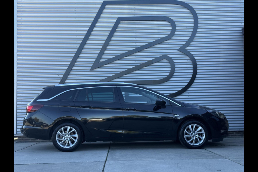 Opel Astra Sports Tourer 1.2 Business Elegance 2e Eigenaar|Camera|Carplay|Trekhaak|PDC V+A|Navi|Cruise|Elek ramen|N.A.P|APK tot 05-2028