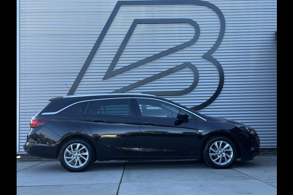 Opel Astra Sports Tourer 1.2 Business Elegance 2e Eigenaar|Camera|Carplay|Trekhaak|PDC V+A|Navi|Cruise|Elek ramen|N.A.P|APK tot 05-2028