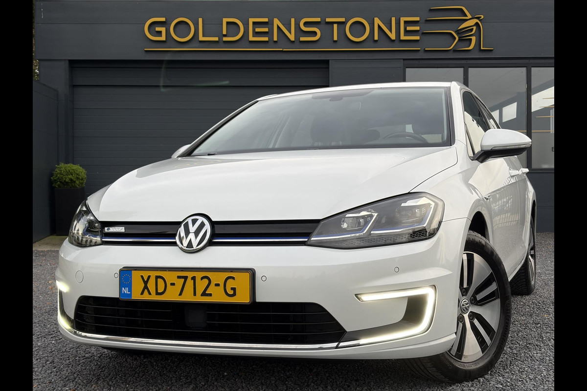 Volkswagen e-Golf e-Golf ✓SOH 85,18 %✓2e Eigenaar✓Carplay✓Navi✓Clima✓Cruise✓Pdc V+A✓136pk✓Lm velgen✓Bj 12-2018✓N.A.P✓Apk tot 10-2027