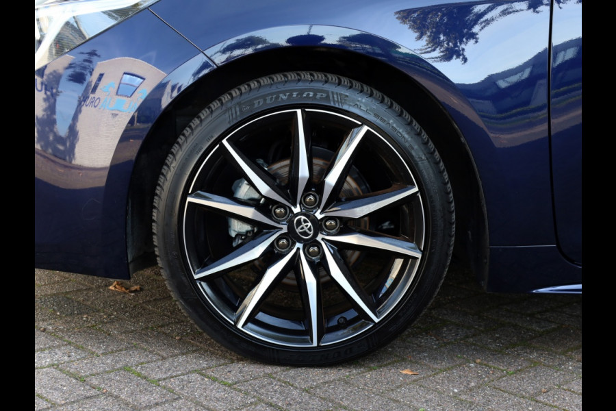 Toyota Corolla Touring Sports Hybrid 140 GR Sport | Bi-Tone | Half Leder | Stoelverwarming