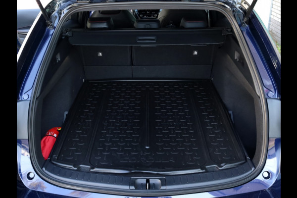 Toyota Corolla Touring Sports Hybrid 140 GR Sport | Bi-Tone | Half Leder | Stoelverwarming