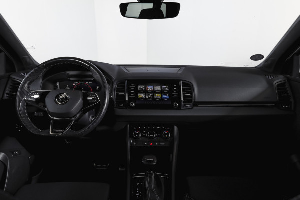 Škoda Karoq 1.5 TSI ACT 150 PK Sportline Business | Afn. Trekhaak | Dig. Cockpit | Adapt. Cruise | Stoel-+Stuurverw. | Matrix LED | Camera | NAV+App. Connect | ECC | Elek. Klep | LM 18" |