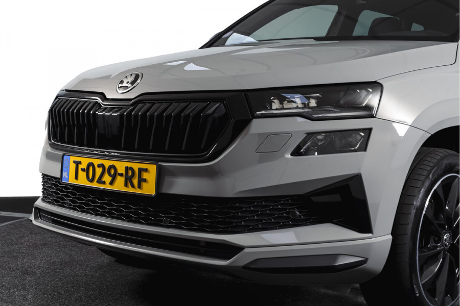 Škoda Karoq 1.5 TSI ACT 150 PK Sportline Business | Afn. Trekhaak | Dig. Cockpit | Adapt. Cruise | Stoel-+Stuurverw. | Matrix LED | Camera | NAV+App. Connect | ECC | Elek. Klep | LM 18" |