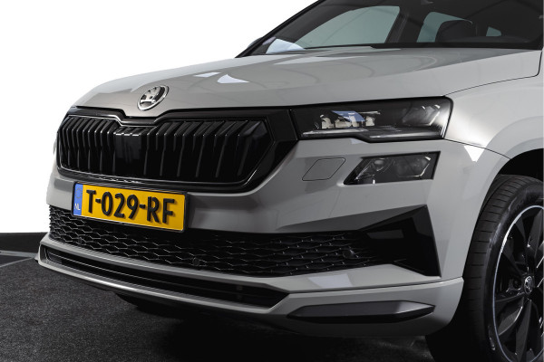 Škoda Karoq 1.5 TSI ACT 150 PK Sportline Business | Afn. Trekhaak | Dig. Cockpit | Adapt. Cruise | Stoel-+Stuurverw. | Matrix LED | Camera | NAV+App. Connect | ECC | Elek. Klep | LM 18" |