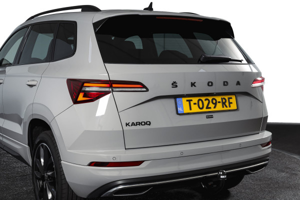 Škoda Karoq 1.5 TSI ACT 150 PK Sportline Business | Afn. Trekhaak | Dig. Cockpit | Adapt. Cruise | Stoel-+Stuurverw. | Matrix LED | Camera | NAV+App. Connect | ECC | Elek. Klep | LM 18" |