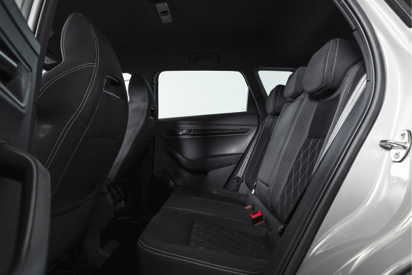 Škoda Karoq 1.5 TSI ACT 150 PK Sportline Business | Afn. Trekhaak | Dig. Cockpit | Adapt. Cruise | Stoel-+Stuurverw. | Matrix LED | Camera | NAV+App. Connect | ECC | Elek. Klep | LM 18" |