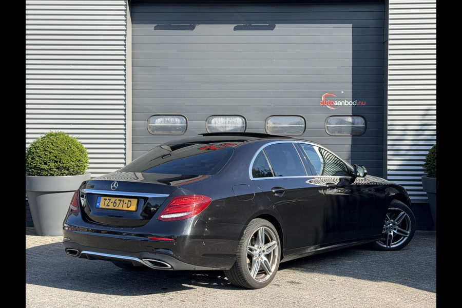 Mercedes-Benz E-Klasse 220 d AMG | Panoramadak | Camera | Sfeerverlichting | Navigatie | Stoelverwarming |