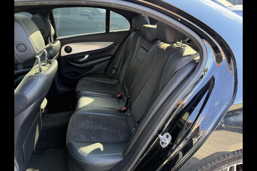 Mercedes-Benz E-Klasse 220 d AMG | Panoramadak | Camera | Sfeerverlichting | Navigatie | Stoelverwarming |