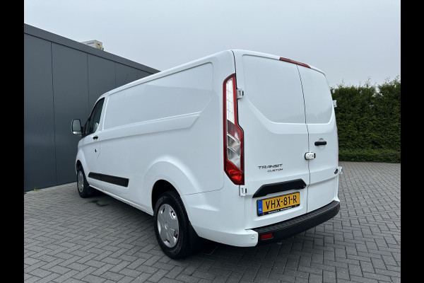 Ford Transit Custom 2.0 TDCI / L2H1 / 1e EIG. / CAMERA / CARPLAY / AIRCO / CRUISE / VOORRUITVERW / 3 ZITS / PDC / 2.800 KG AHG
