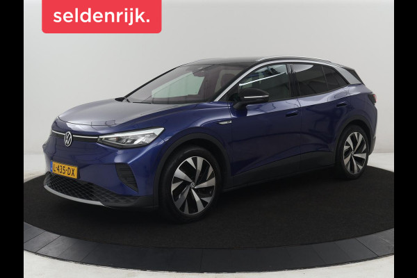 Volkswagen ID.4 First 77 kWh SOH 89,3% | Trekhaak | Camera | LED | Stuur/stoel verwarming | Adaptive cruise | Park assist | Sfeerverlichting |
