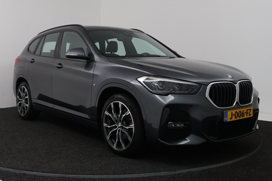 BMW X1 sDrive18i High Executive (SFEERVERLICHTING, NAVIGATIE, CRUISE CONTROL, DEALER ONDERHOUDEN)