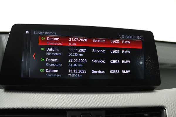 BMW X1 sDrive18i High Executive (SFEERVERLICHTING, NAVIGATIE, CRUISE CONTROL, DEALER ONDERHOUDEN)