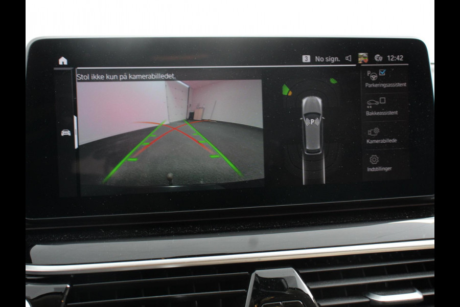 BMW 5 Serie Touring 530e High Executive Automaat SoH 88% Trekhaak Leder Navigatie Camera Adaptive Cruise Control Apple Carplay Android Auto Elektrisch Verstelbare Stoelen Stoelverwarming Climate Control Lichtmetalen velgen
