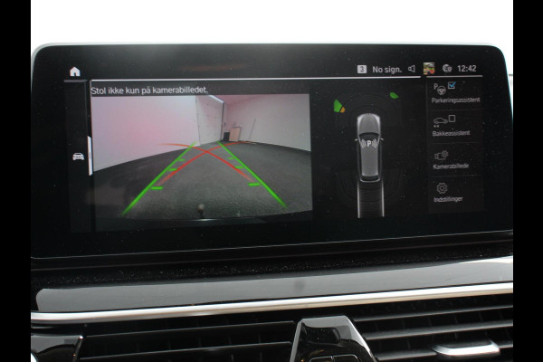BMW 5 Serie Touring 530e High Executive Automaat SoH 88% Trekhaak Leder Navigatie Camera Adaptive Cruise Control Apple Carplay Android Auto Elektrisch Verstelbare Stoelen Stoelverwarming Climate Control Lichtmetalen velgen