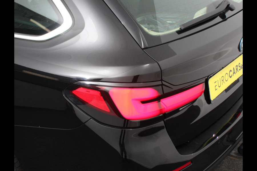 BMW 5 Serie Touring 530e High Executive Automaat SoH 88% Trekhaak Leder Navigatie Camera Adaptive Cruise Control Apple Carplay Android Auto Elektrisch Verstelbare Stoelen Stoelverwarming Climate Control Lichtmetalen velgen