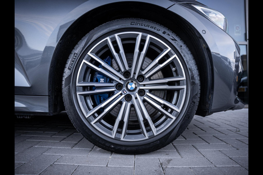 BMW 3 Serie Touring 330e High Executive - M-Sport l Laser l Pano l Trekhaak l HUD