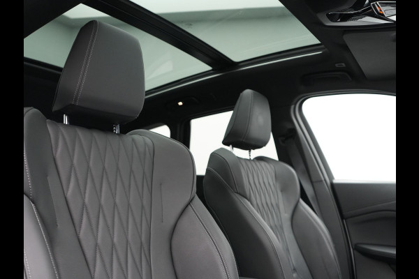 BMW iX1 xDrive30 M Sport 313pk Dealer O.H. | Trekhaak Af Fabriek | Panodak | 360 Camera | Head Up | Lederen Sportstoelen Memory & Verwarmd | Stuur Verwarmd | Keyless | BLIS | Sfeerverlichting | Apple Carplay | Navigatie | DAB | 20"L.M
