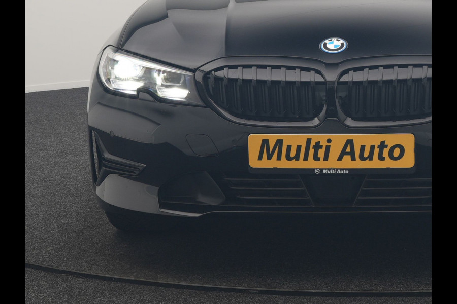 BMW 3 Serie Touring 320e Sportline PHEV Dealer O.H | Panodak | Adaptive Cruise | Camera | Blis | Apple Carplay | Sportstoelen Verwarmd | Navigatie | DAB | 17"L.M | Plug In Hybrid