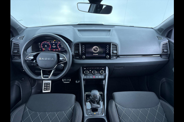 Škoda Karoq 1.5 TSI ACT Sportline Business 150 pk Automaat (DSG) | Verlengde garantie | Navigatie via App | Parkeersensoren | Achteruitrijcamera | Adaptieve cruise control | Stoelverwarming v/a | Verwarmde voorruit |