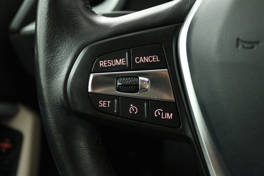 BMW 2 Serie Gran Coupé 220i Business Edition (CRUISE CONTROL, NAVIGATIE, SFEERVERLICHTING)