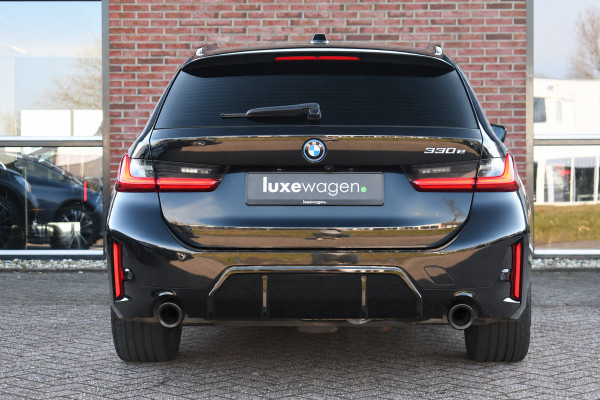 BMW 3 Serie Touring 330e M-Sport Pano DA-Prof E-zetels HUD 19inch