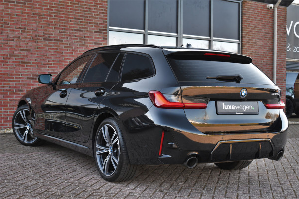 BMW 3 Serie Touring 330e M-Sport Pano DA-Prof E-zetels HUD 19inch