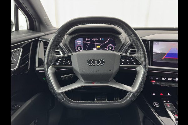 Audi Q4 e-tron 40 S edition 77 kWh (3-Fase-11kW) (INCL.BTW) *HEAT-PUMP | LEATHER-FABRIC | MATRIX-LED | ADAPTIVE-CRUISE | CAMERA | DIGI-COCKPIT | KEYLESS | AMBIENT-LIGHT | AUDI-SOUND | NAVI-FULLMAP | PRIVACY-GLASS | ECC | PDC | 20''ALU*
